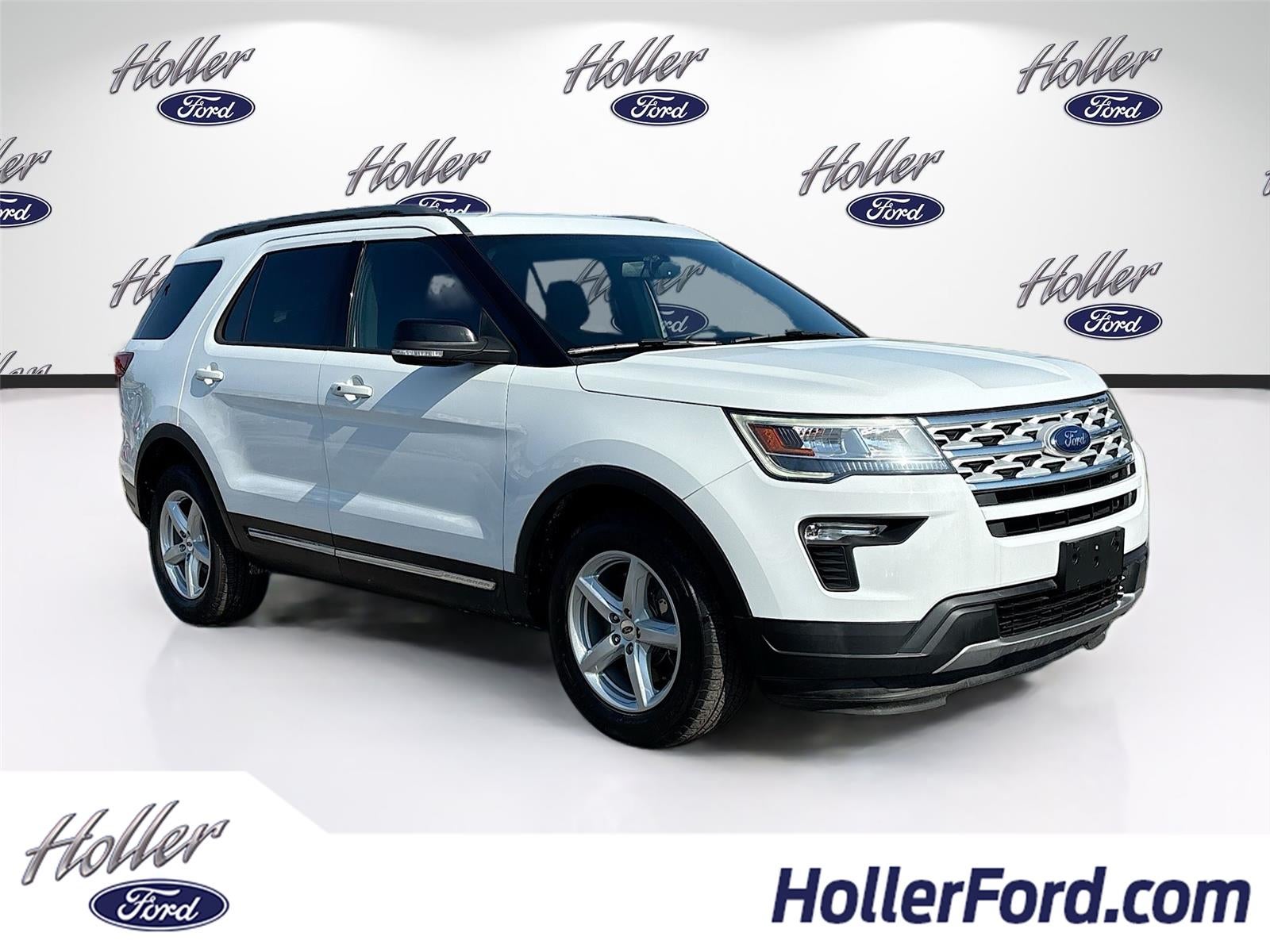 2018 Ford Explorer XLT in Oxford White — front three-quarter view